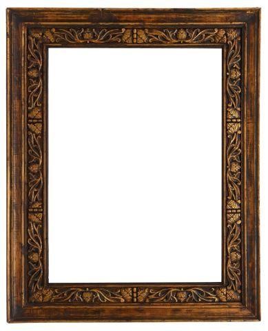 Appraisal: Large hand-carved and parcel gilt wood frame India th c