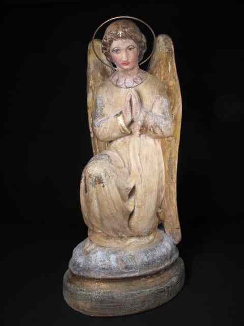 Appraisal: Plaster Santos-style polychrome angel figurine Depicts angel praying Halo connected