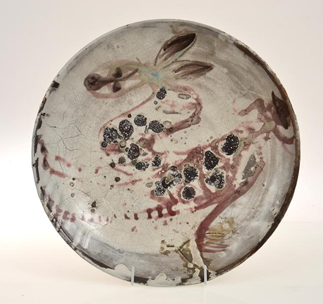 Appraisal: JOHN PERCEVAL - AN EARTHENWARE CHARGER REPAIRED