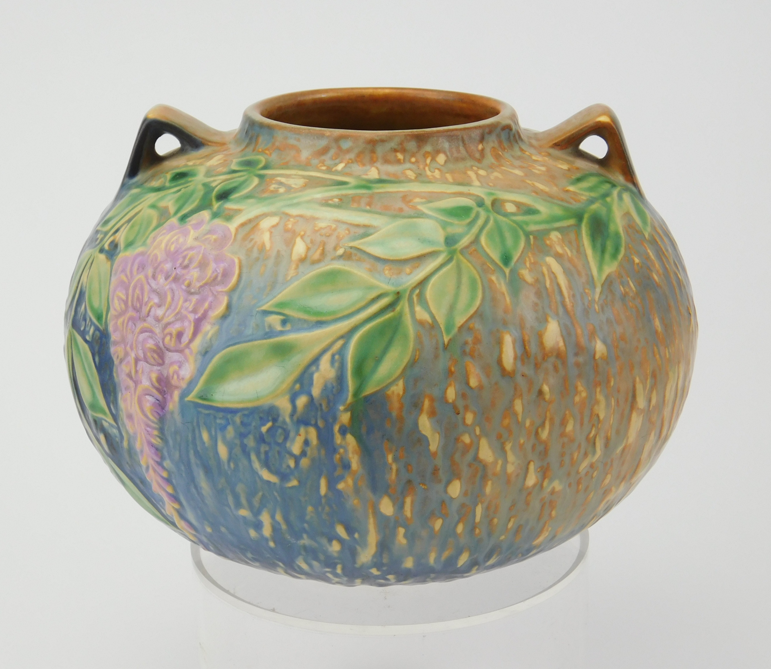 Appraisal: Roseville pottery Wisteria vase ca pattern design by Frank Ferrell