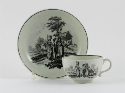 Appraisal: A Worcester teacup and saucer printed in black with The