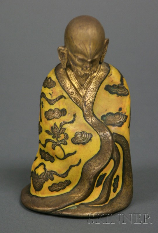 Appraisal: Enameled and Engraved Brass Figure of a Seated Buddhist Saint