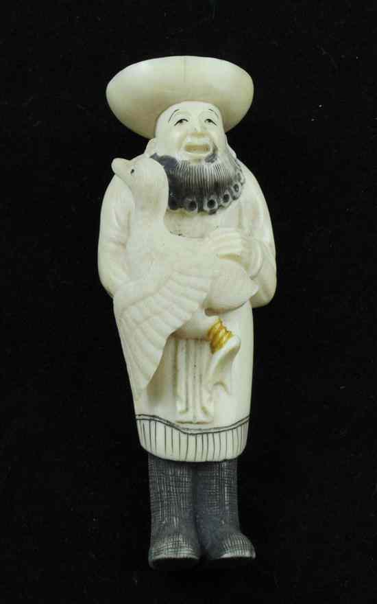 Appraisal: A th century ivory netsuke carved as a Dutchman holding