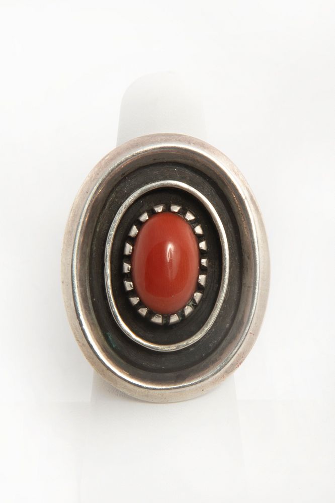 Appraisal: A Coral and Sterling Navajo Silver Ring Navajo A Coral