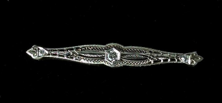 Appraisal: Art Deco-Style Eighteen-Karat White Gold and Diamond Bar Pin containing