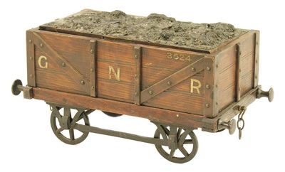 Appraisal: An oak smoker's compendium modelled as a railway coal truck