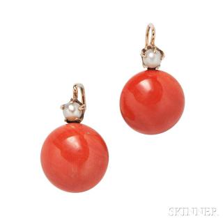 Appraisal: kt Gold and Coral Earrings set with coral buttons measuring