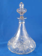 Appraisal: A silver mounted cut glass ship's decanter London