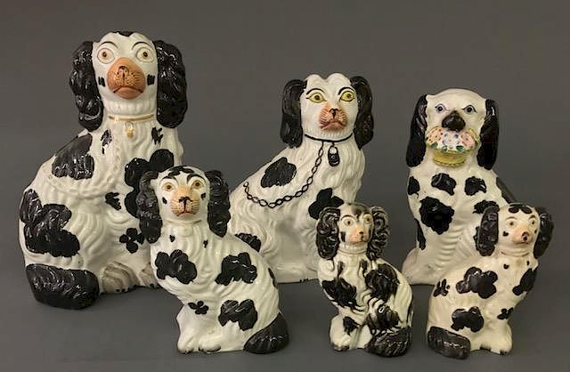 Appraisal: Six Staffordshire Black Spaniels Six Staffordshire black spaniels tallest h