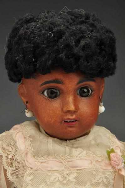 Appraisal: Small SFBJ Brown Bisque Child Doll Description Doll incised SFBJ