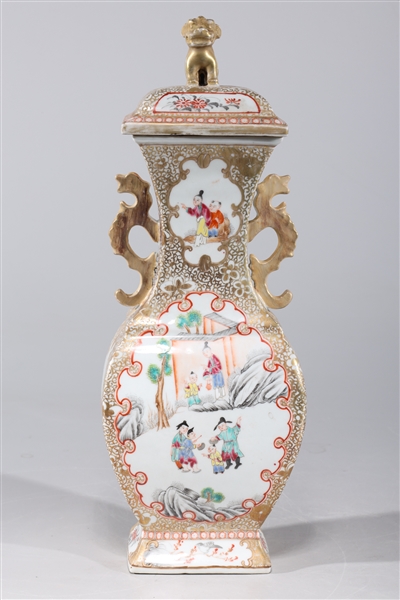 Appraisal: Chinese gilt porcelain covered vase with molded handles and lion