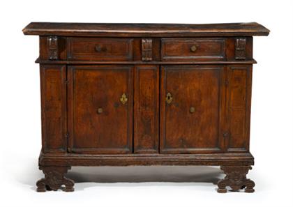 Appraisal: Italian carved walnut credenza th century The rectangular top above