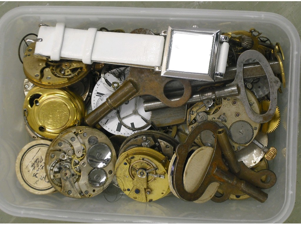 Appraisal: Tub of assorted watch parts including movements keys springs balance