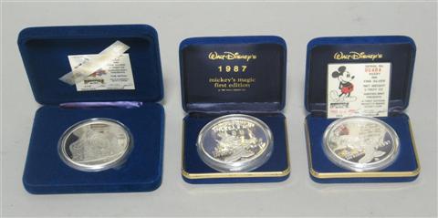 Appraisal: THREE DISNEY COLLECTIBLE SILVER COINS Including two first edition Mickey's