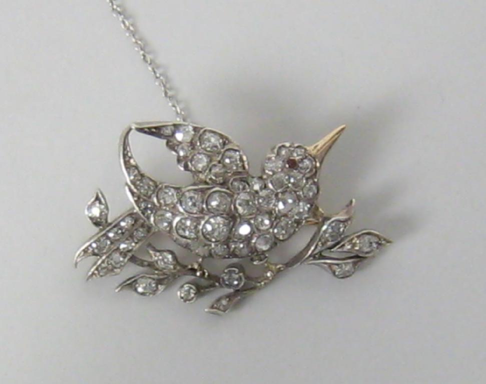 Appraisal: A Diamond Bird Brooch the numerous circular and rose-cut stones