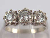 Appraisal: An carat white gold three stone diamond ring estimated total