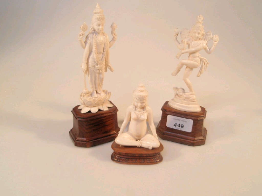 Appraisal: Three Ivory Art Academy ivory Indian figures of deities each