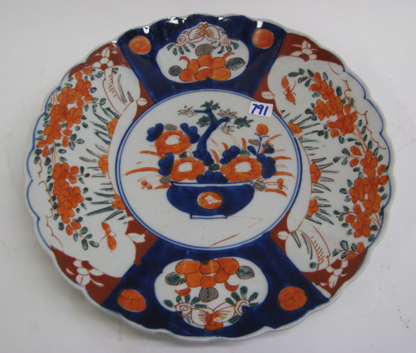 Appraisal: A JAPANESE IMARI TH C PORCELAIN CHARGER the face hand