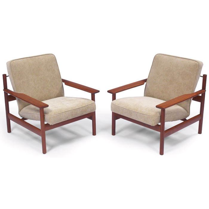 Appraisal: Grete Jalk lounge chairs pair teak frames with wide armrests