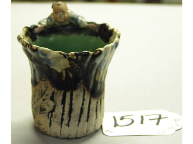 Appraisal: Tang dynasty style tri color glazed tea cup with figure