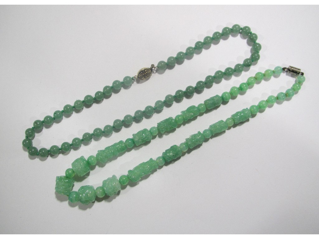 Appraisal: Two jade bead necklaces