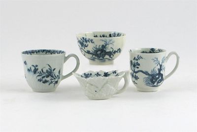 Appraisal: Two Worcester blue and white coffee cups one feather moulded