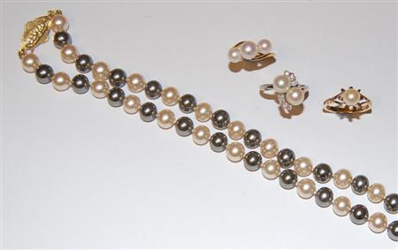 Appraisal: An ct white gold mounted cultured pearl and diamond set