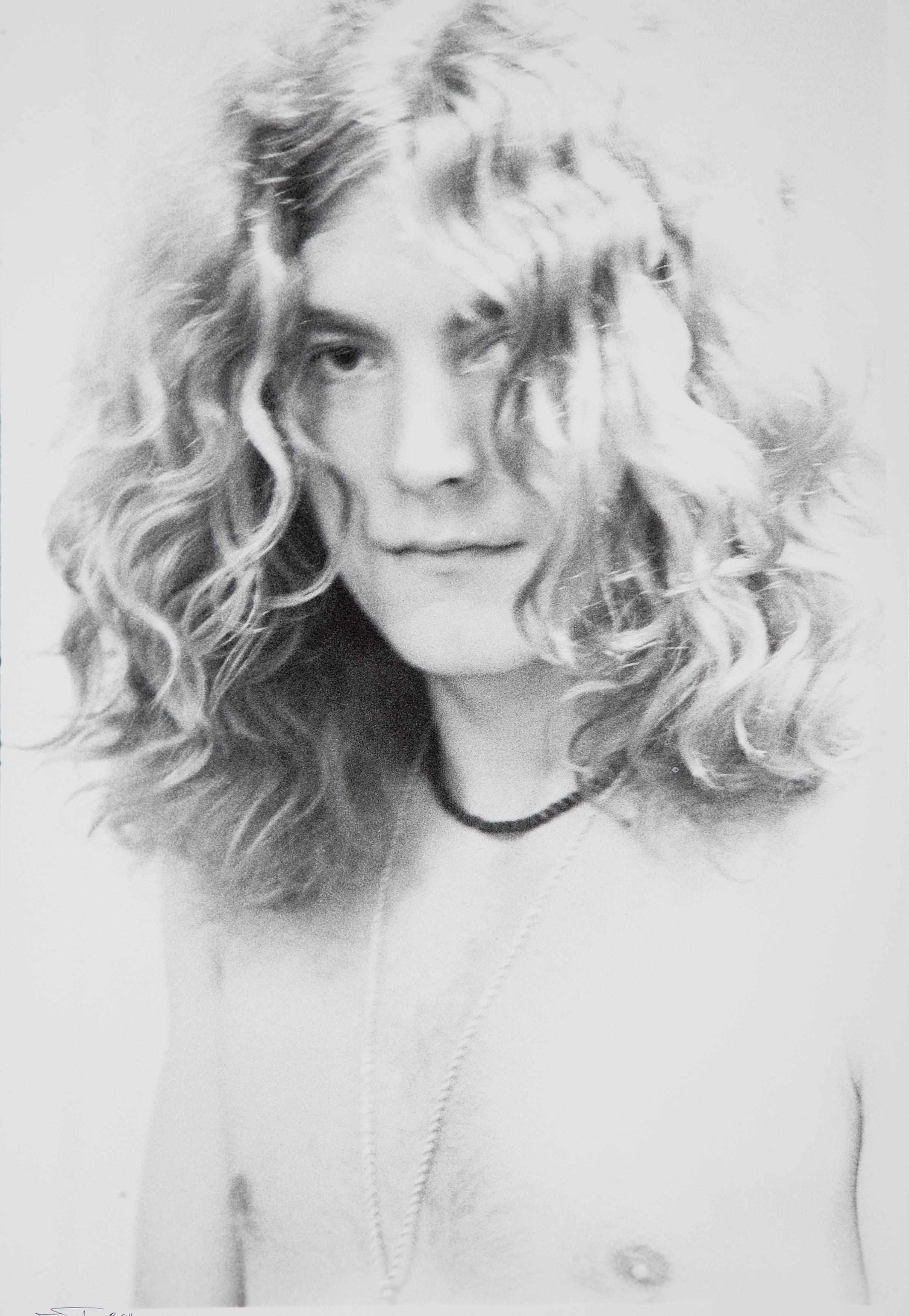 Appraisal: Led Zeppelin's Robert Plant A bust-length gelatin silver print by