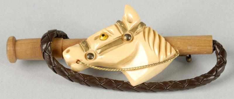 Appraisal: Bakelite Horse Head on Wooden Bar Pin Description Leather strap