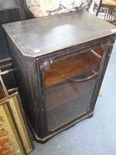 Appraisal: A VICTORIAN EBONISED MUSIC CABINET with boxwood stringing to the