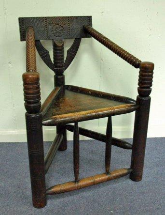 Appraisal: A th Century turner's chair with intricately carved bar back