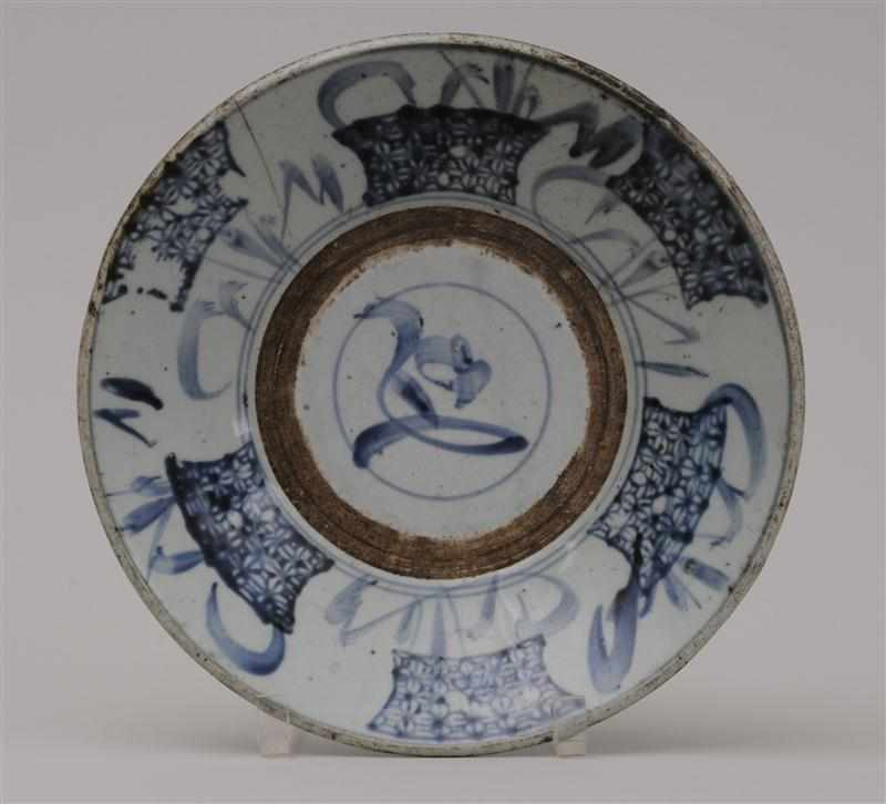 Appraisal: JAPANESE BLUE AND WHITE POTTERY SHALLOW BOWL The interior with