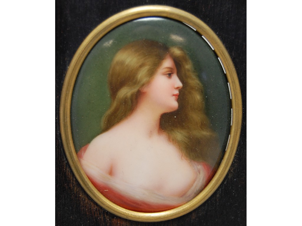 Appraisal: Berlin-style oval porcelain plaque painted with a young lady