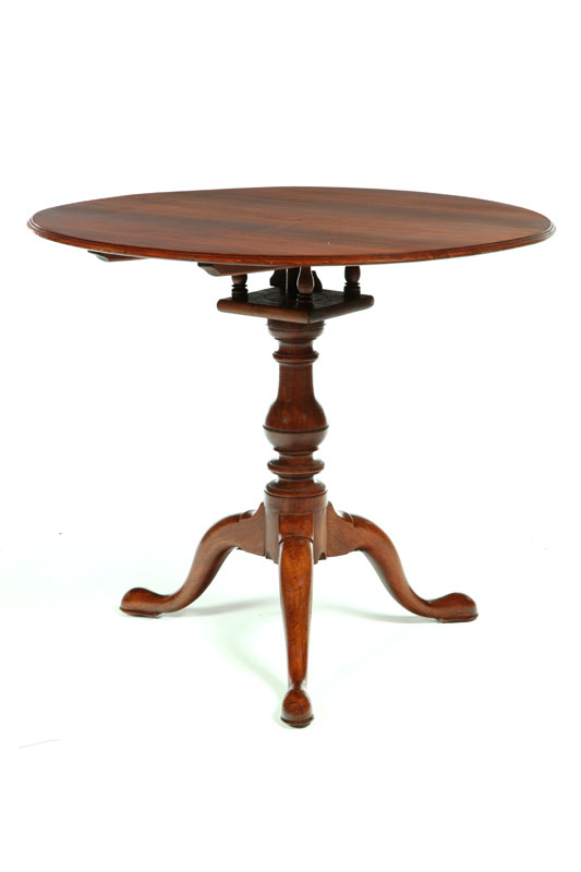 Appraisal: CHIPPENDALE TILT-TOP TEA TABLE Pennsylvania th century walnut Molded top