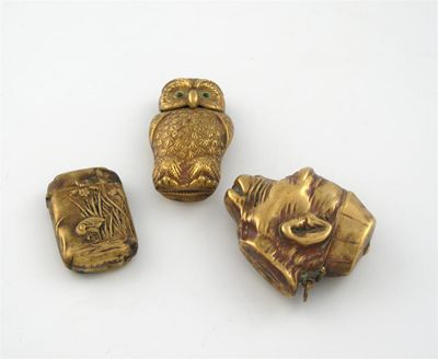 Appraisal: Three novelty brass vesta cases in the form of an