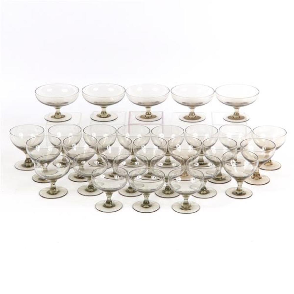 Appraisal: RUSSEL WRIGHT PIECE MORGANTOWN AMERICAN MODERN SMOKE GLASS STEMWARE COLLECTION