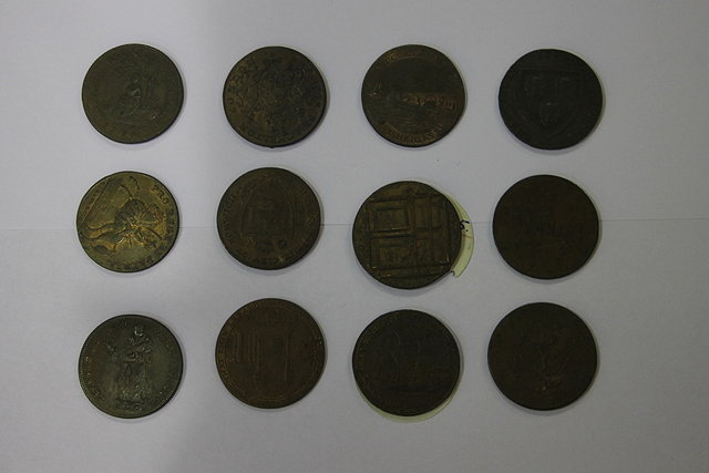 Appraisal: TWELVE TH CENTURY HALF PENNY TOKENS Manchester Norwich Lowestoft Bath