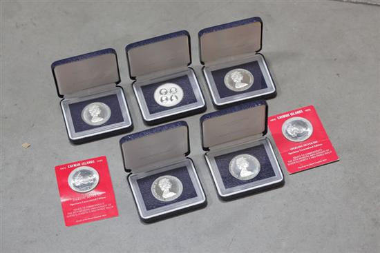 Appraisal: SEVEN SILVER ISLAND COINS Two Cayman Island coins each in