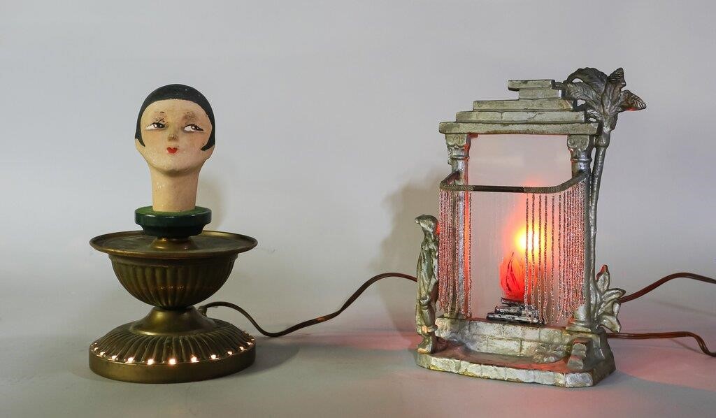 Appraisal: ART DECO LAMPS Art Deco lamps Painted composite lady's head