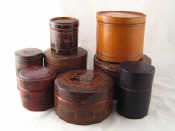 Appraisal: Seven Burmese cylindrical boxes some with internal trays most lacquered