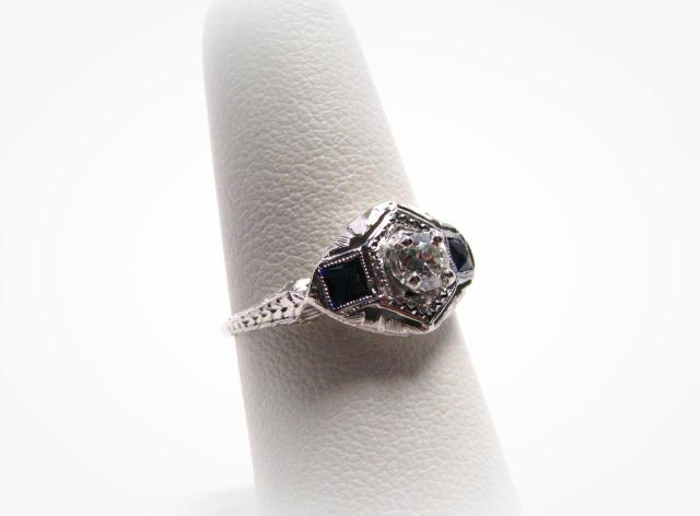 Appraisal: k white gold filigree ring with approximately ct center diamond