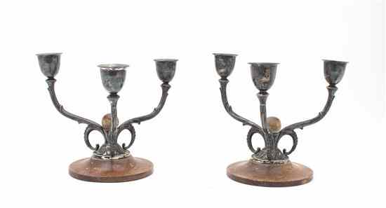 Appraisal: A Pair of Arts and Crafts Silver Candelabra each issuing