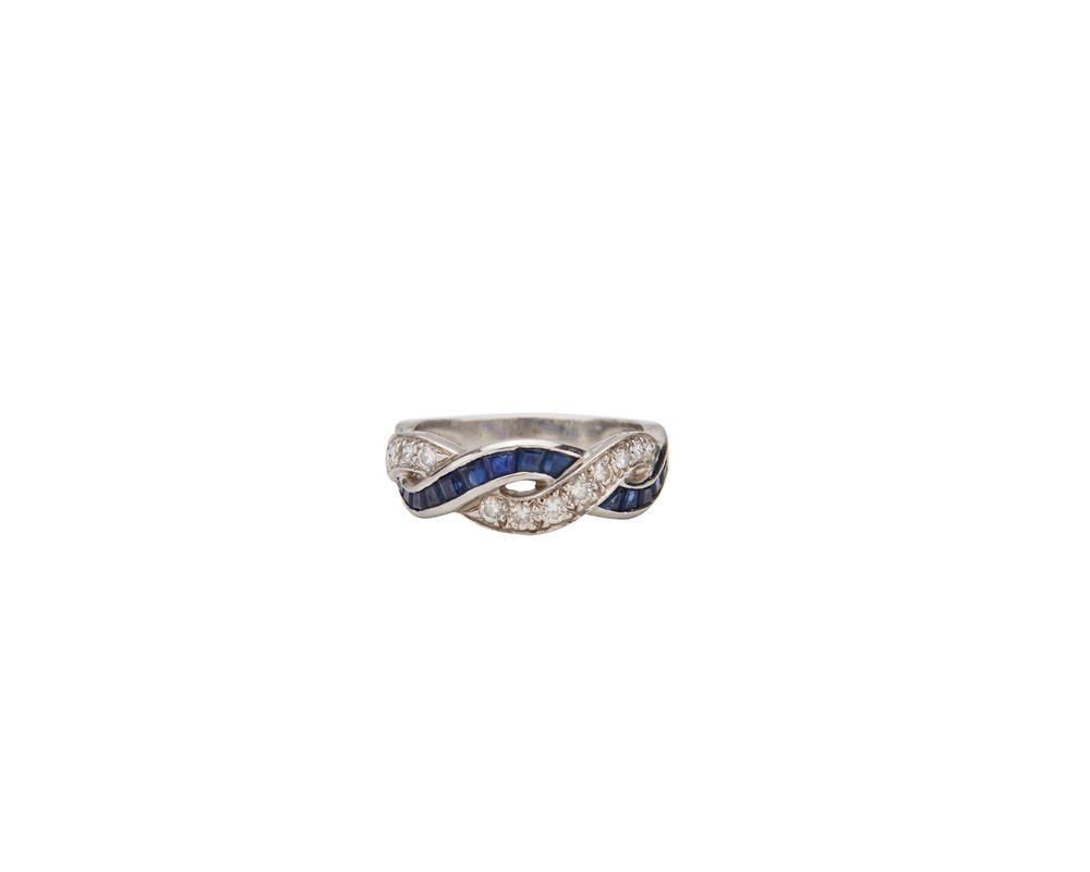 Appraisal: Platinum Sapphire and Diamond Ring of twisted design featuring round