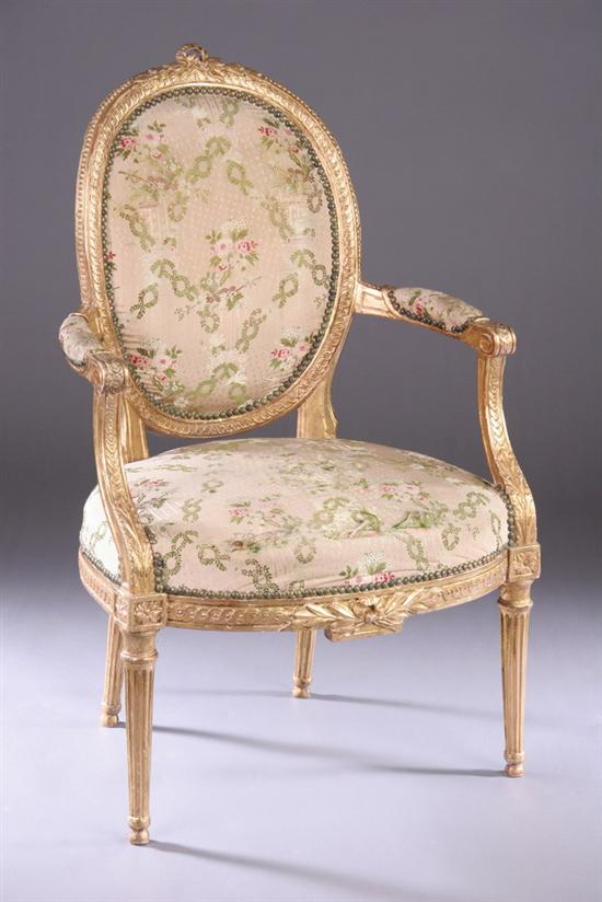 Appraisal: FRENCH LOUIS XVI GILTWOOD FAUTEUIL EN CABRIOLET Late th century