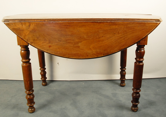 Appraisal: A Walnut Drop-leaf Table c with slide outs from the