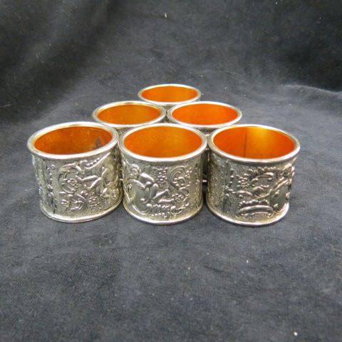 Appraisal: Set of Silverplate Napkin Rings cherub foliage excellent