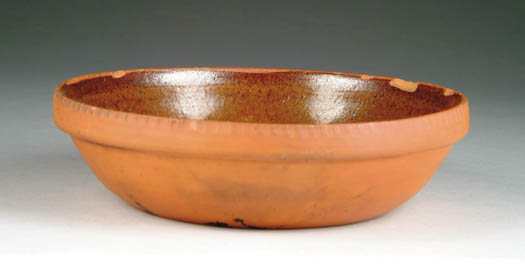 Appraisal: GLAZED REDWARE BOWL Greenish brown glaze with speckle decoration Sloping