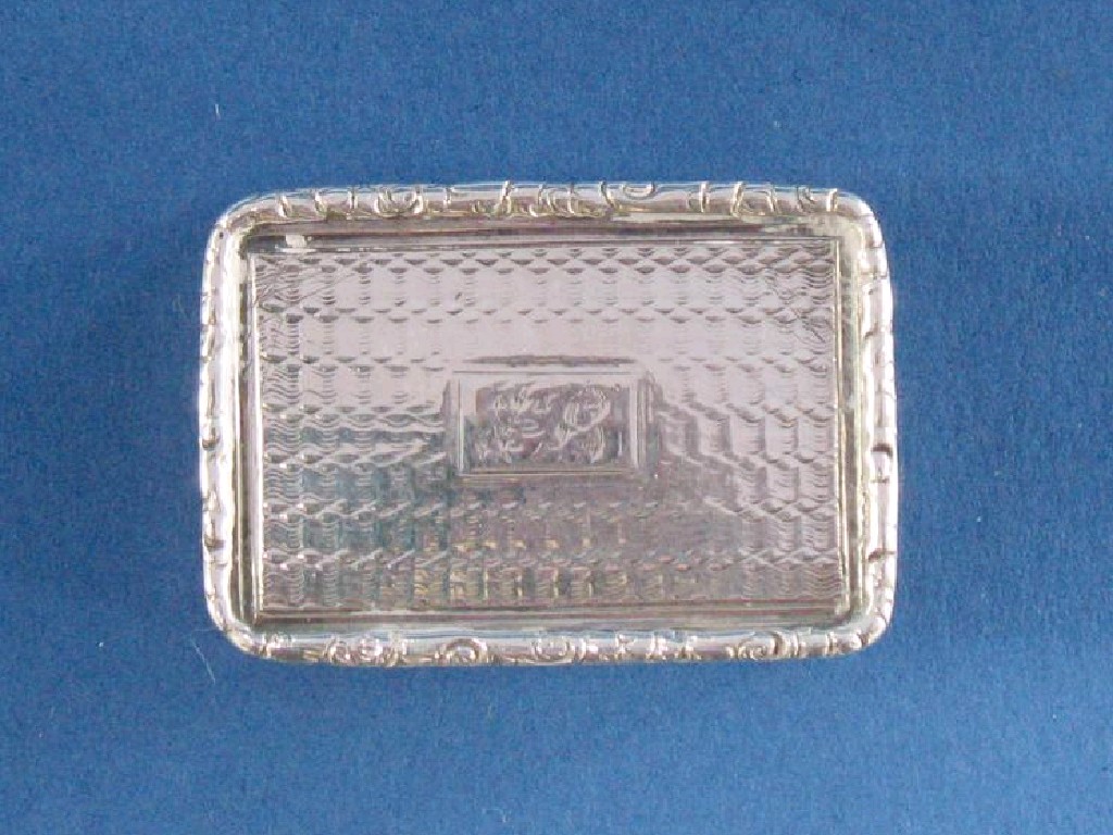 Appraisal: A VICTORIAN VINAIGRETTE of rectangular form with cushion borders florally