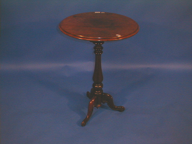 Appraisal: A Victorian mahogany tripod table with moulded circular top baluster