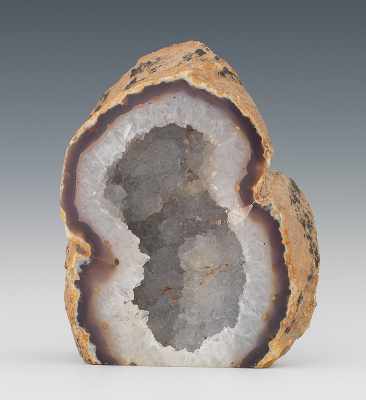 Appraisal: A Quartz Specimen with Crystal Cavity Geode cut slab showing